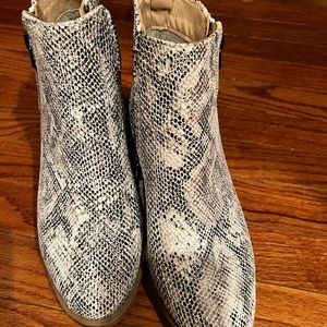 Super cute boutique boots. Never worn-snakeskin print